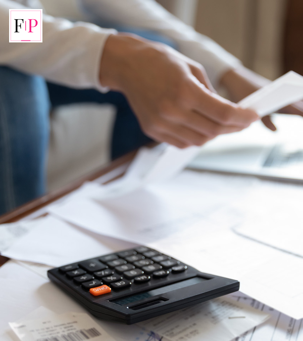 UK household reviewing energy bills and paperwork for the cost of living payment 2026