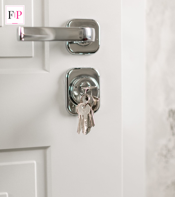 Stamp Duty Changes 2026: What UK Home Buyers Must Know House keys hanging in a front door lock, illustrating the UK stamp duty changes guide for 2026 buyers