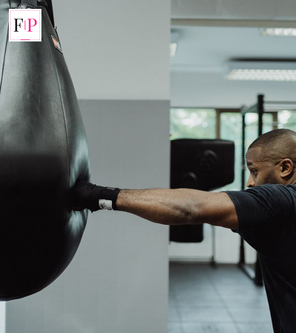 AJ vs Fury Press Conference: 7 Training Secrets Revealed Boxer hitting a heavy bag during training camp ahead of the AJ vs Fury press conference fight build-up