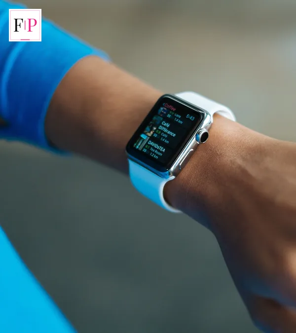 A white-strap smartwatch on a wrist showing a list of places on its screen — best smartwatch 2026 everyday use