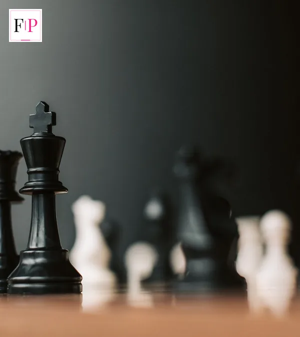 Celebrity Traitors Episode 7: Date, Time and Preview A black chess king in sharp focus among blurred pieces — the strategy behind celebrity traitors episode 7